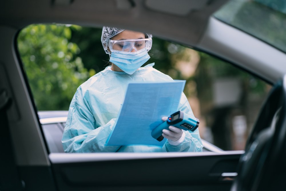 What Medical Assessments Are Part of Bus Driver Training? 1 Nurse wears a protective suit and mask during the HGV Medical Assessments